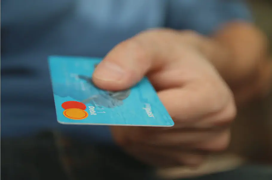 Hand holding credit card